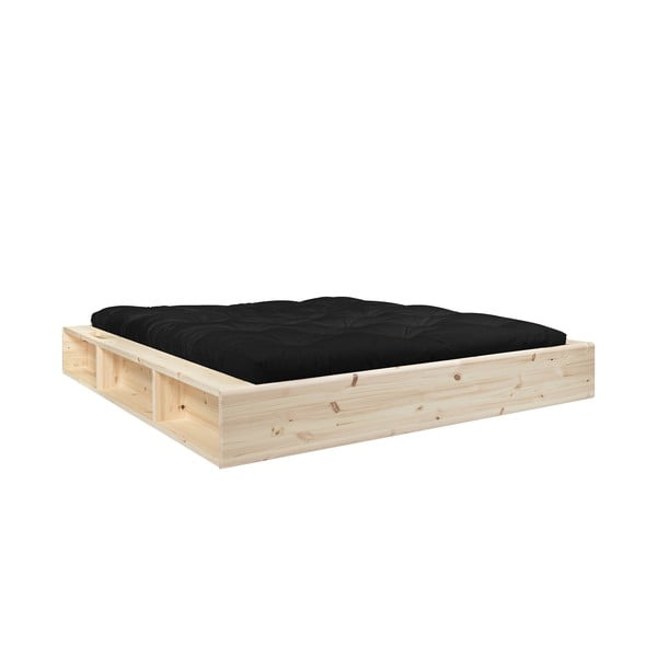 Dvojlôžková posteľ z masívneho dreva s úložným priestorom a čiernym futonom Double Latex Karup Design Ziggy, 180 x 200 cm