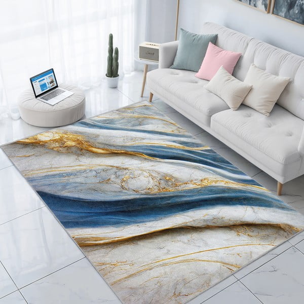 Modrý prateľný koberec 80x150 cm Golden Spill – Mila Home-image-1