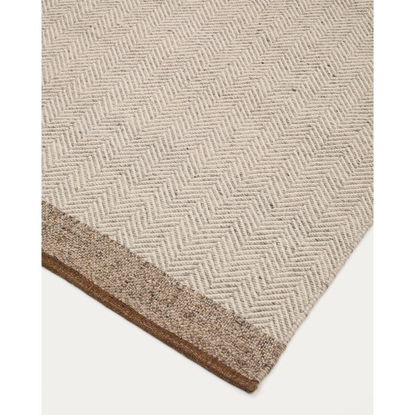Béžový obojstranný ručne tkaný vlnený koberec 200x300 cm Nifelia – Kave Home-image-3