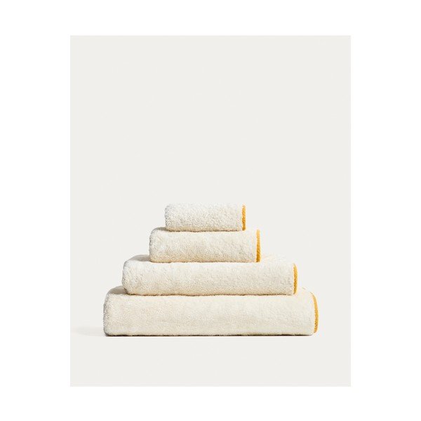 Žltý/biely froté bavlnený uterák 30x50 cm Sedora – Kave Home-image-3