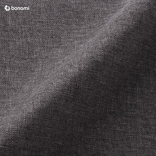 Tmavosivé kreslo s čiernymi nohami Actona Cazar-image-1