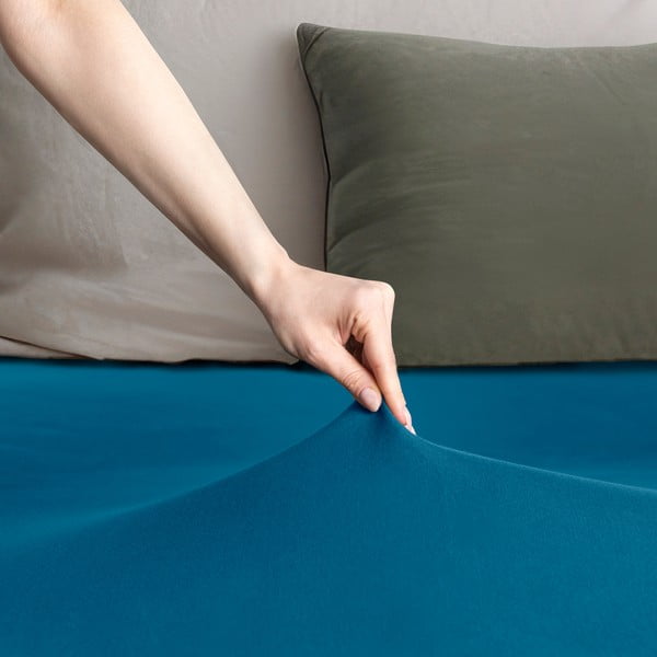 Napínacia plachta jersey v petrolejovej farbe 140x200 cm Amber – Restilo-image-1