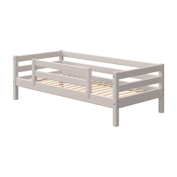 Sivá detská posteľ z borovicového dreva s bezpečnostnou lištou Flexa Classic