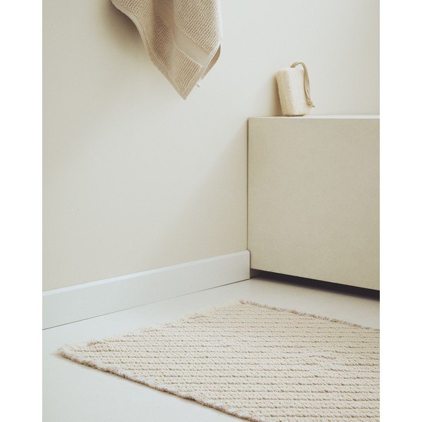 Béžová kúpeľňová predložka 50x70 cm Janu – Kave Home-image-1