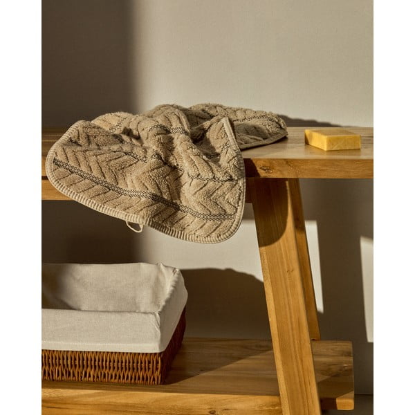 Béžový froté bavlnený uterák 50x90 cm Rune – Kave Home-image-1
