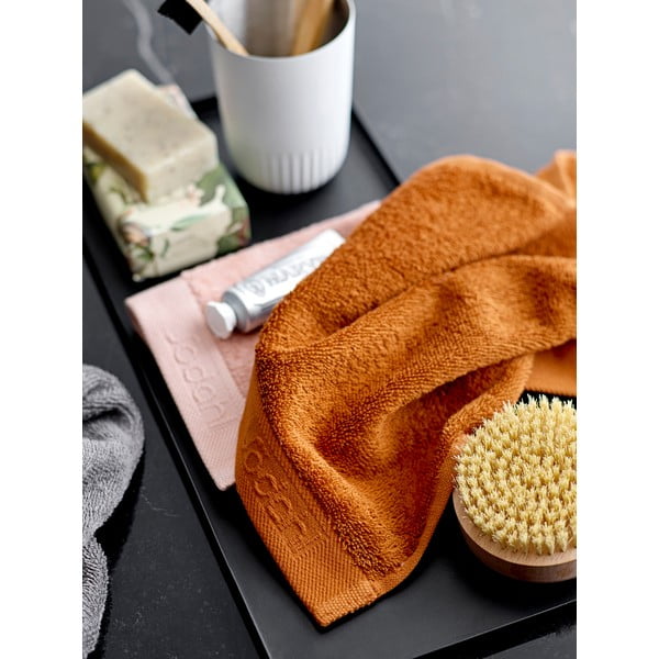 Oranžový uterák z froté bavlny Södahl Clay, 100 x 50 cm-image-1