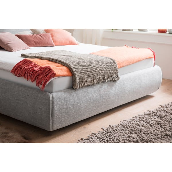 Sivá čalúnená dvojlôžková posteľ s úložným priestorom s roštom 180x200 cm Atesio – Meise Möbel-image-1