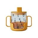 Horčicovožltý detský hrnček Design Letters Grow With Your Cup