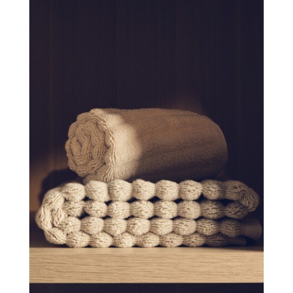 Béžová froté bavlnená osuška 70x140 cm Navira – Kave Home-image-1