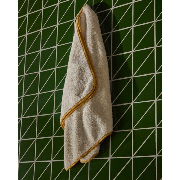 Žltý/biely froté bavlnený uterák 50x90 cm Sedora – Kave Home-image-1