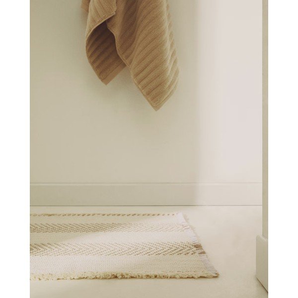 Béžová kúpeľňová predložka 50x70 cm Bina – Kave Home-image-1