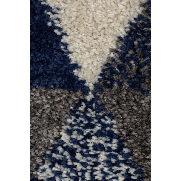 Tmavomodrý koberec Flair Rugs Nuru, 80 x 150 cm-image-1