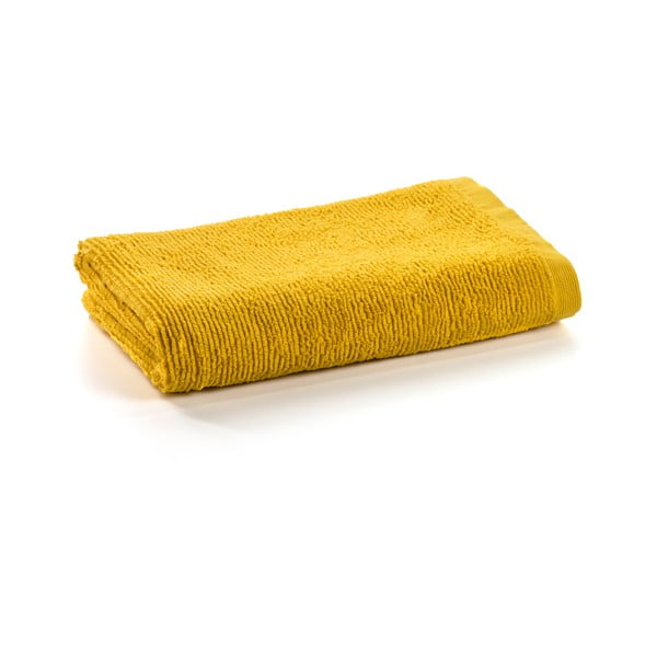 Žltá bavlnená osuška Kave Home Miekki, 70 x 140 cm