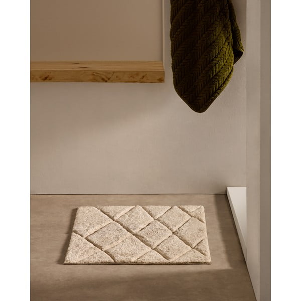 Béžová kúpeľňová predložka 50x70 cm Nyana – Kave Home-image-1