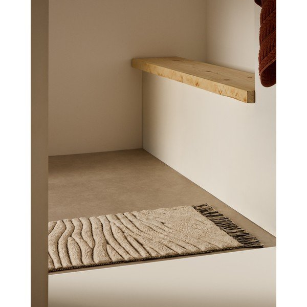 Béžová kúpeľňová predložka 50x70 cm Crilda – Kave Home-image-1