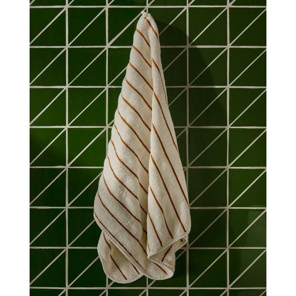 Oranžový/béžový froté bavlnený uterák 50x90 cm Dorane – Kave Home-image-1