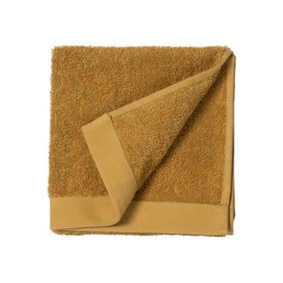Žltý uterák z froté bavlny Södahl Golden, 100 x 50 cm