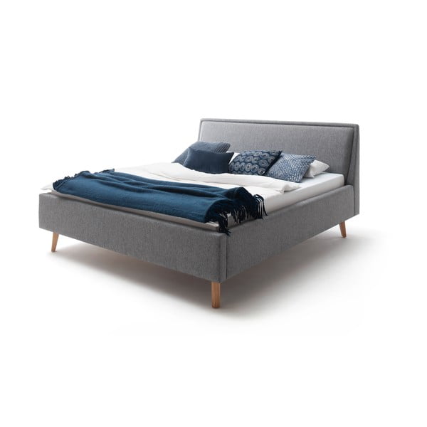 Svetlosivá čalúnená dvojlôžková posteľ s úložným priestorom s roštom 180x200 cm Frieda – Meise Möbel