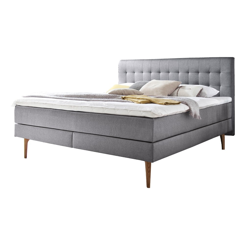 E-shop Svetlosivá čalúnená dvojlôžková posteľ s matracom Meise Möbel Massello, 180 x 200 cm