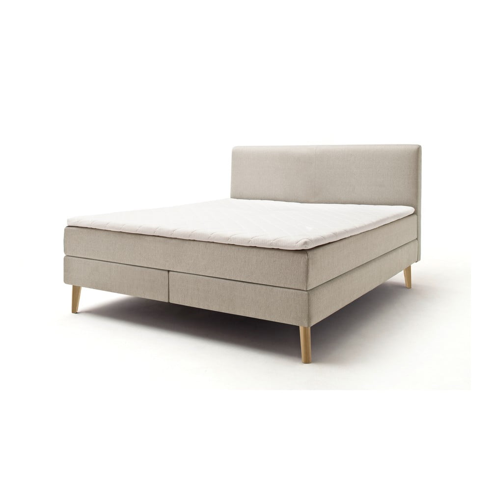 E-shop Béžová čalúnená dvojlôžková posteľ s matracom Meise Möbel Greta, 180 x 200 cm