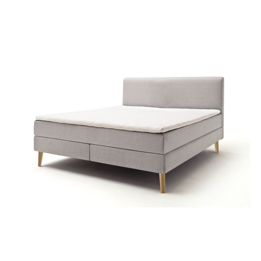 E-shop Svetlosivá čalúnená dvojlôžková posteľ s matracom Meise Möbel Greta, 160 x 200 cm