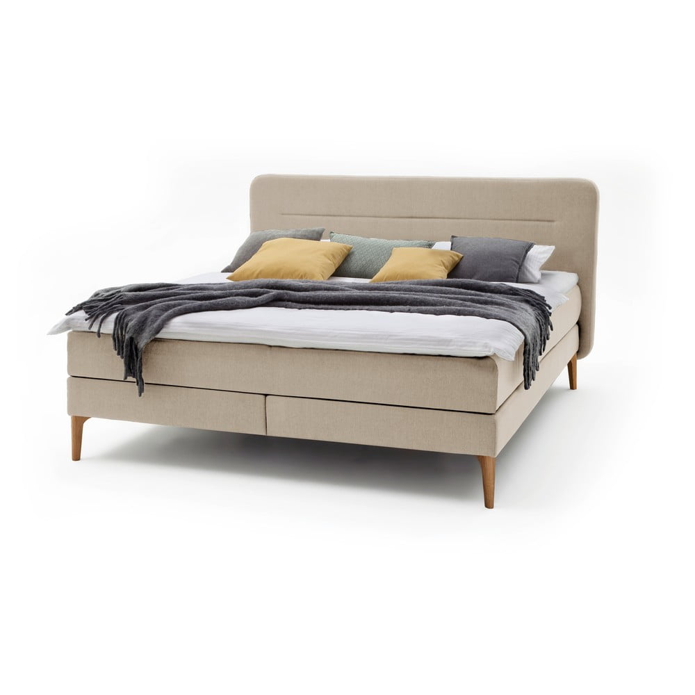 E-shop Béžová čalúnená dvojlôžková posteľ s matracom Meise Möbel Massello, 180 x 200 cm