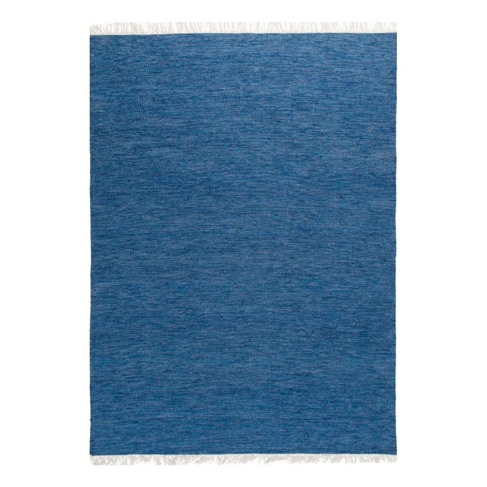 Modrý ručne tkaný vlnený koberec Linie Design Solid, 140 x 200 cm