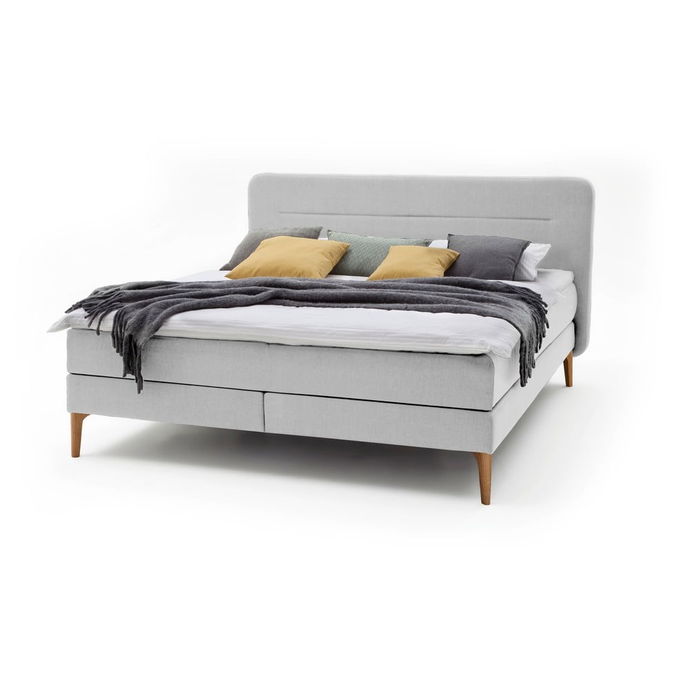 E-shop Svetlosivá čalúnená dvojlôžková posteľ s matracom Meise Möbel Massello, 160 x 200 cm
